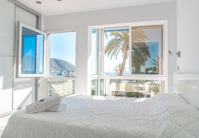 Bedroom with views of the fishing port of Moraira