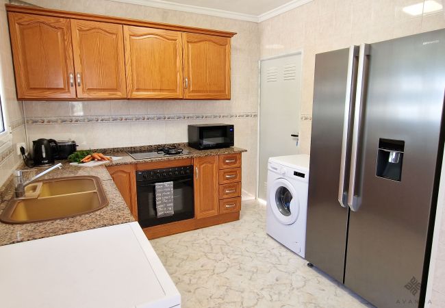 Large kitchen with direct access from the ground floor, with pine furniture and well equipped.