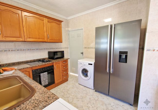 Large kitchen with direct access from ground floor.