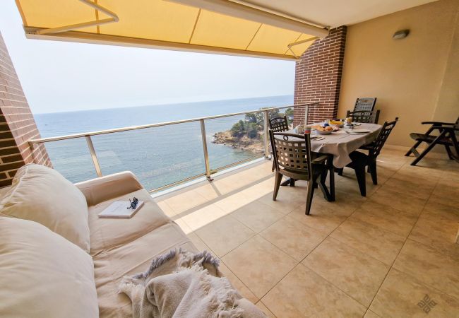 Terrace with furniture and sea views.