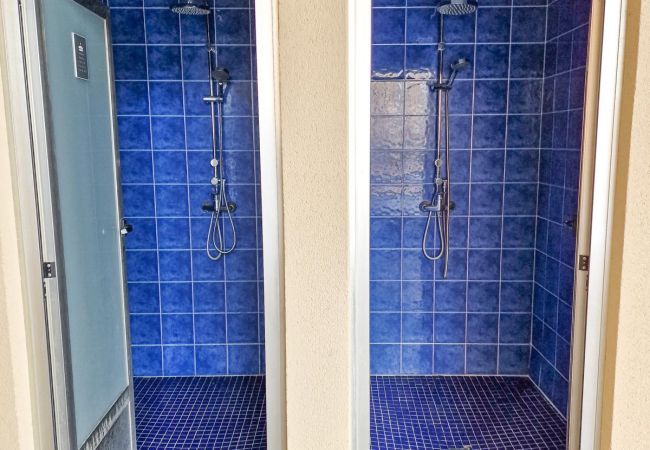 Communal swimming pool showers.