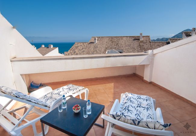 Duplex penthouse for holiday rentals in the centre of Altea with partial sea views from the terraces.